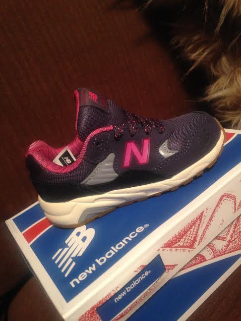 Pink and gray New Balance kids sneakers
