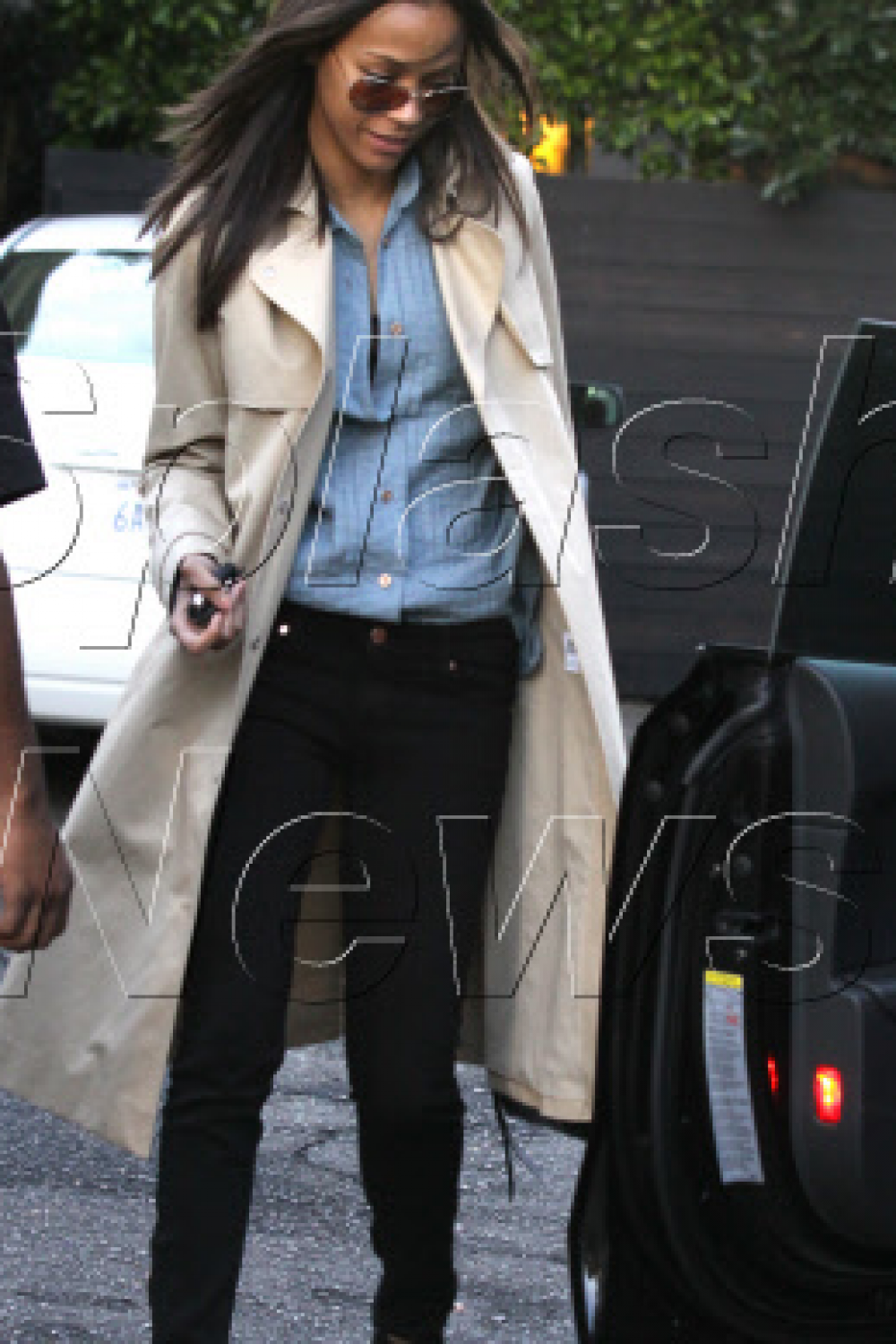 Zoe Saldana’s Chic Lacoste Trench