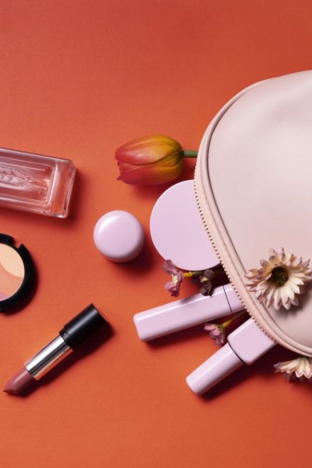 flat-lay-cosmetics-coral-background