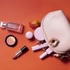 flat-lay-cosmetics-coral-background