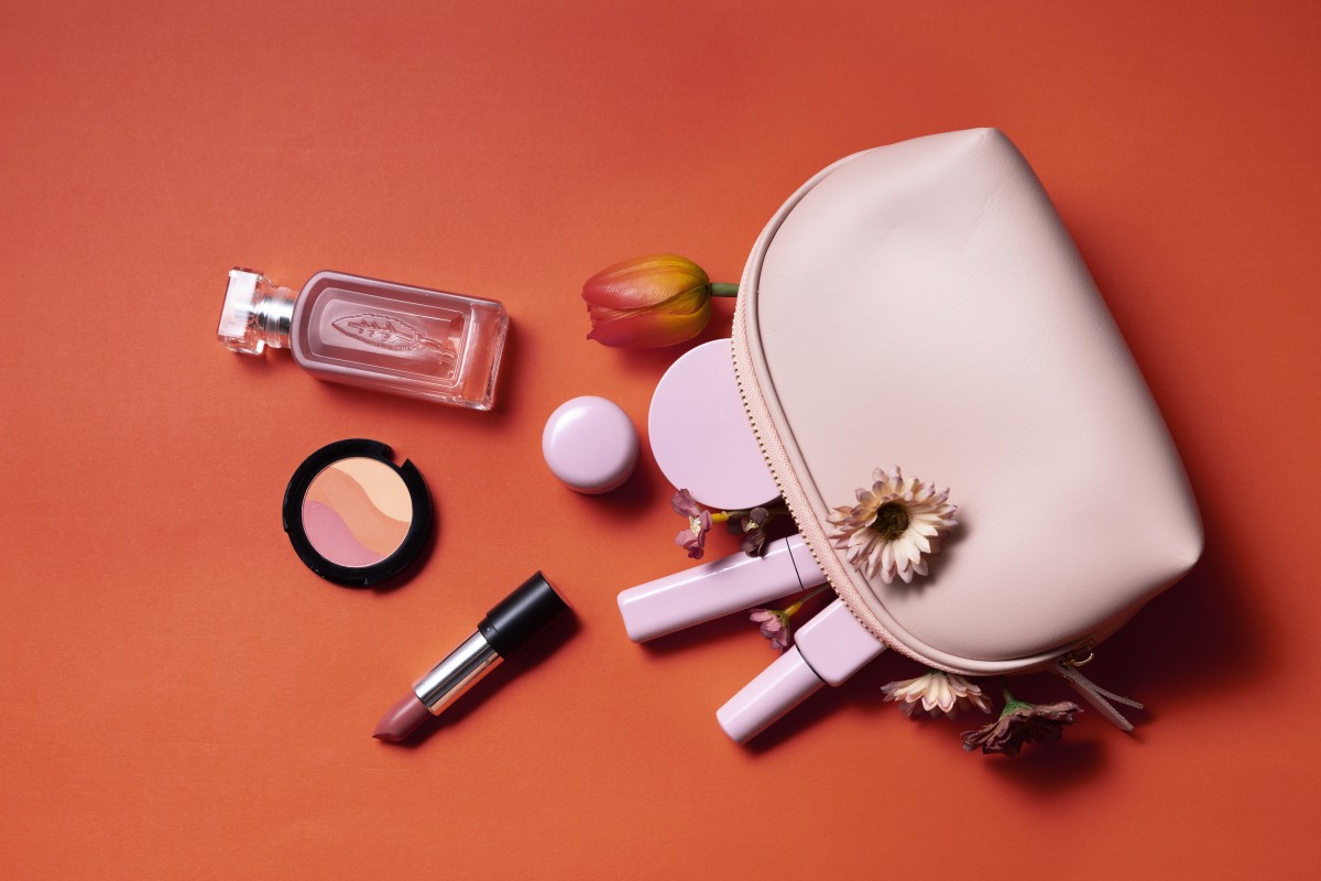 flat-lay-cosmetics-coral-background